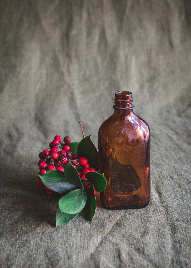 Litteä, ruskea pullo